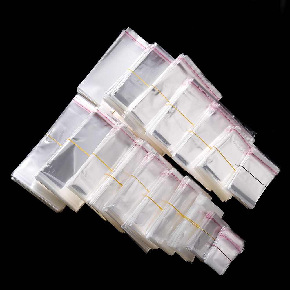 100 stks/partij Transparante Zelfklevende Seal Zakken OPP Plastic Cellofaan Zakken Tas & Pouch Sieraden Verpakking Zakken