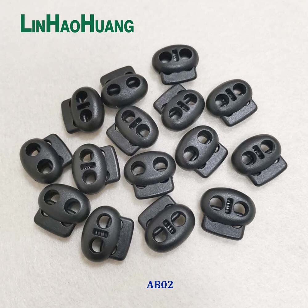 100 stk/lot svart pom plast kule ledning lås veksler plast 2 hull fjær stoppere 4mm strikk sjokk ledning