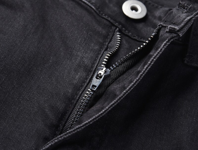 negro icono Hombres estilo ceñido rasgado Jeans Hiphop Bordado de letras agujero roto hombre Casual Jeans pantalones vaqueros