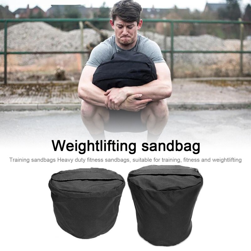 Sylinder sterk mann sandsekker kraftig boksing treningsstudio trening Fitness makt sandsekk til kryss trening vektløfting steinløft