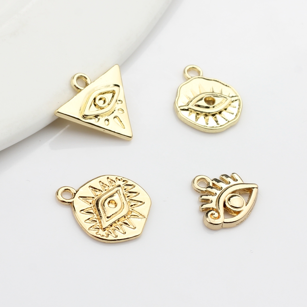 10 stk / lot zinklegering gyldent metal sød mini dæmon øje charms vedhæng til diy smykker gør at finde tilbehør