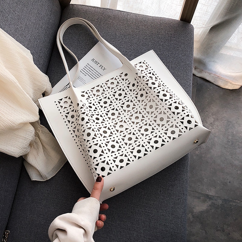 Grande capacité femmes sacs à main en cuir Pu dames sac à bandoulière créateur de femme évider sacs de messager
