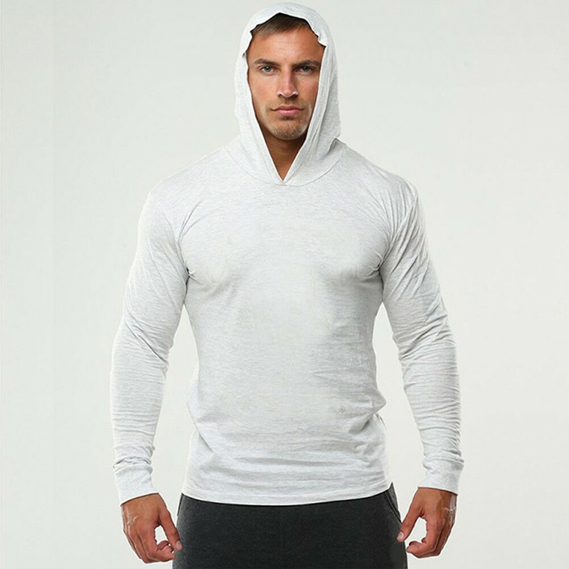 Ropa de gimnasio de Color sólido, camiseta ajustada de manga larga con capucha, Sudadera con capucha transpirable de algodón, ropa deportiva muscular para culturismo y Fitness para hombre