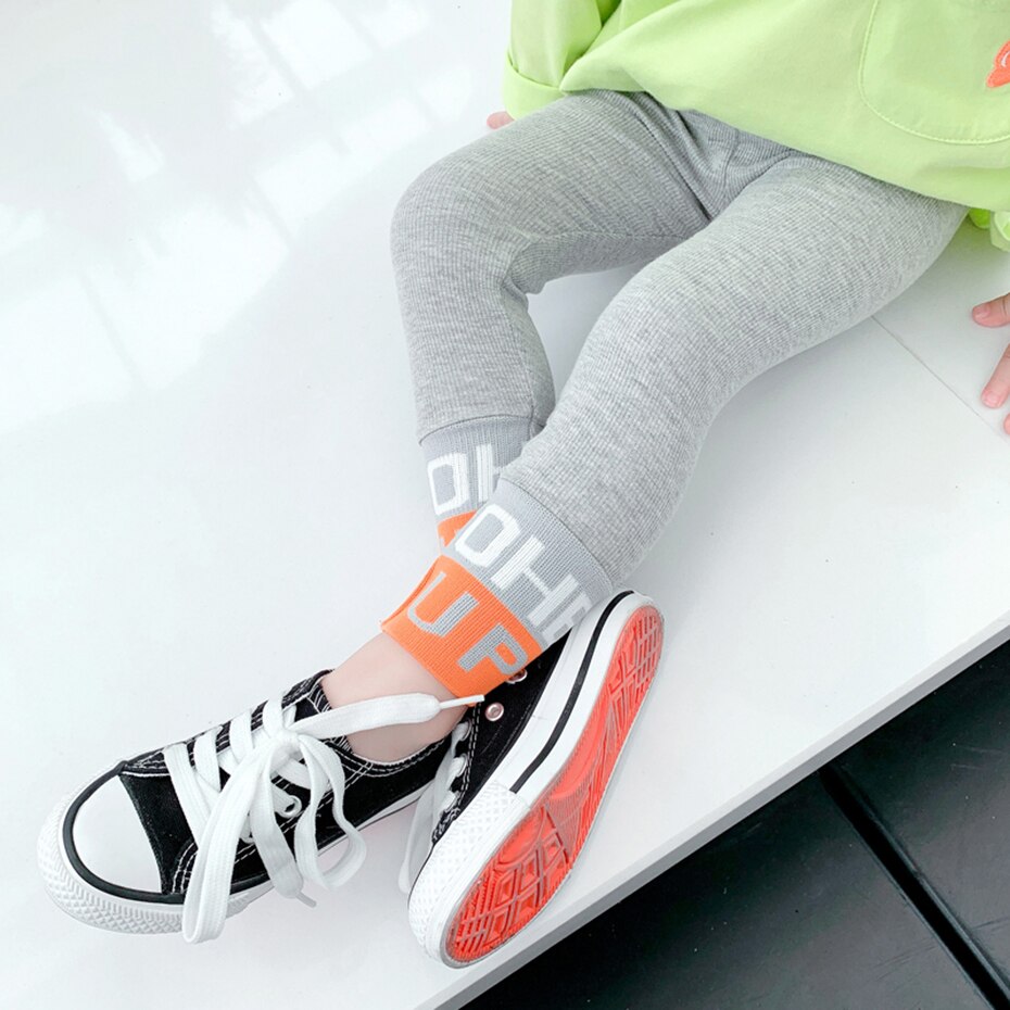 Leggings ragazza lettera ragazze pantaloni Slim pantaloni Patchwork per bambini primavera autunno bambino ragazza vestiti stile Casual