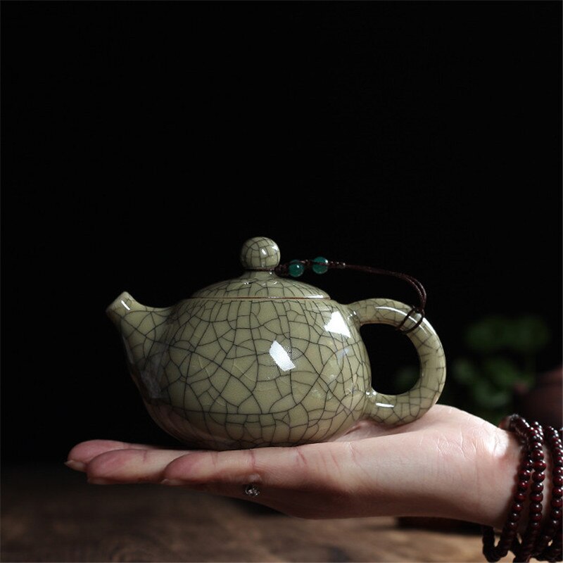 Juego de té con esmalte craquelado, tetera china de cerámica celadón longquan con horno ge, tetera antigua de arcilla yixing.