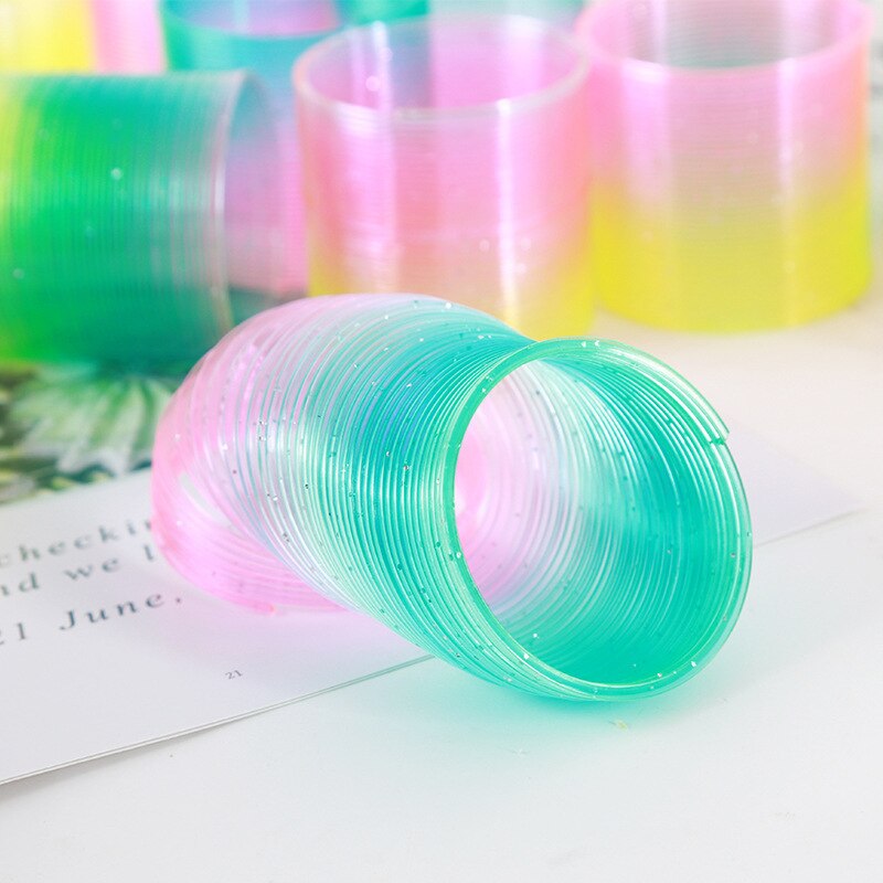 T Kreative Kunststoff Spule Spielzeug Bunte Regenbogen Ring freundlicher Kleine Spielzeug Hersteller Direkt Stall