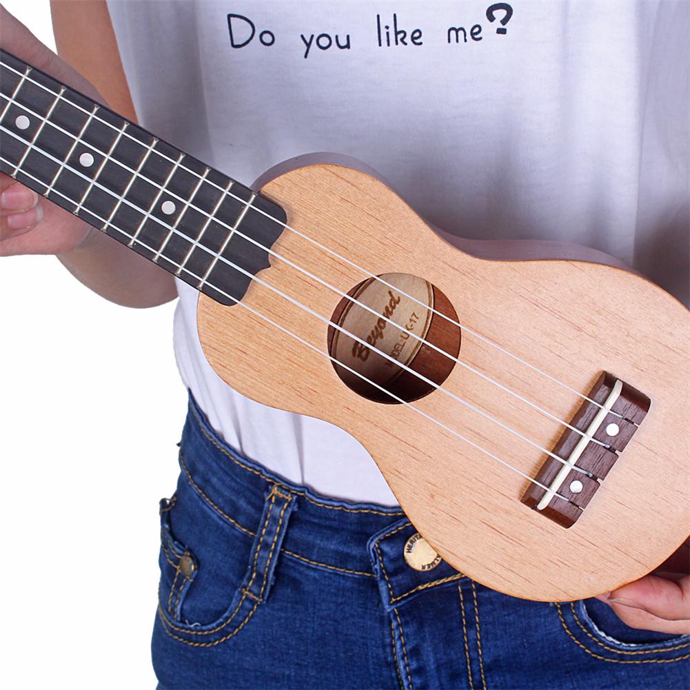 Mini guitare de poche en bois de séquoia, Ukulele 4 cordes, Mini Instrument de musique hawaïen, jouet avec sac, pour enfants, 17 pouces