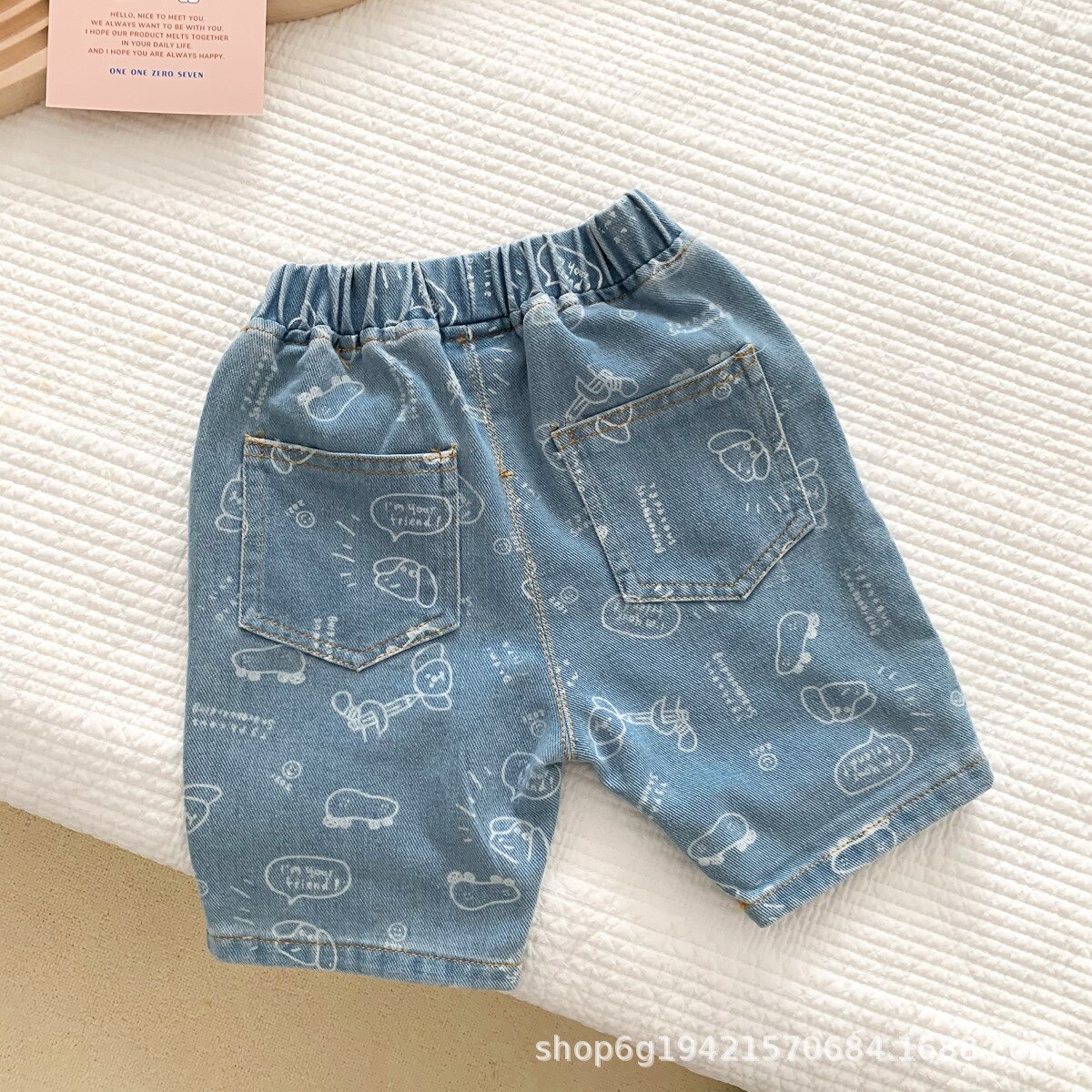 Nuovi pantaloni di jeans per bambini pantaloncini di jeans con stampa di cartoni animati di moda per ragazzi ragazze pantaloni Casual estivi per bambini 2022 pantaloni larghi per bambini: light blue / 6T  130cm