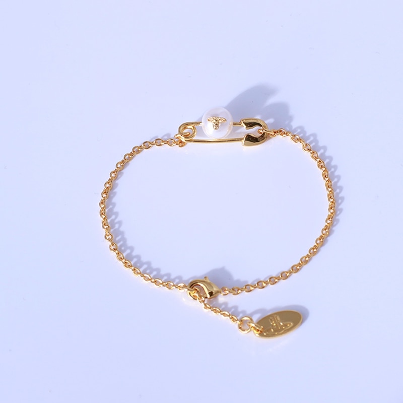 Simple pin shape inlaid with pearl Saturn logo Bracelet