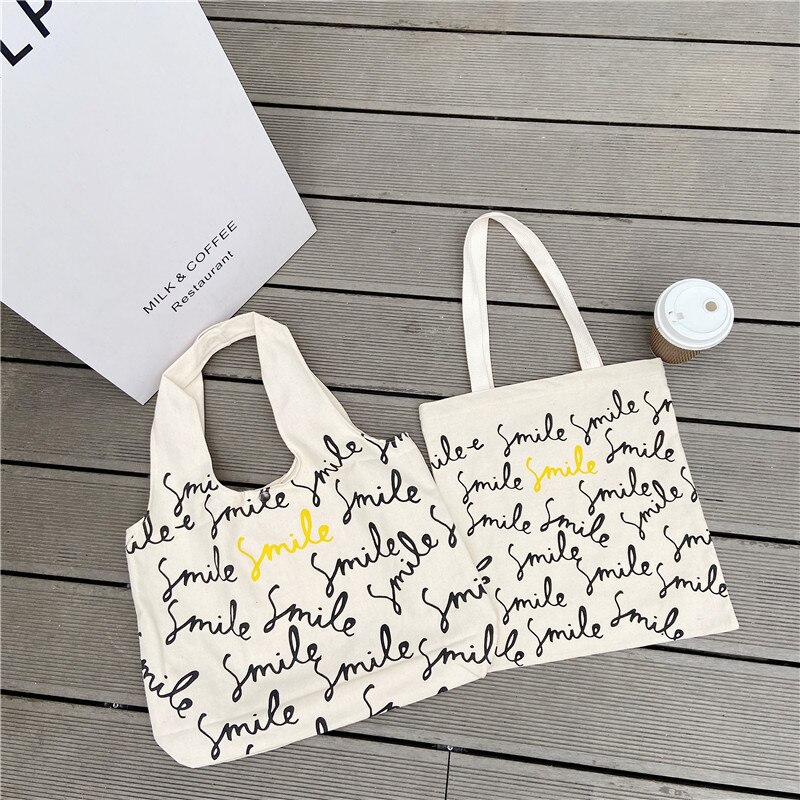 Einkaufstasche aus canvas mit smiley-schriftzug, große schultertasche aus baumwollstoff für damen, strandtasche