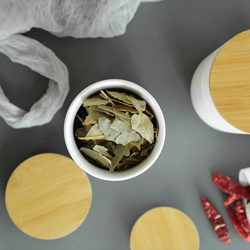 Vaso di stoccaggio sigillato in ceramica bianca semplice con coperchio in legno 260ML 800ML 1000ML contenitore per alimenti da cucina teiera organizzatore di cereali