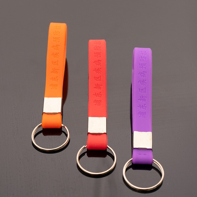 Verarbeitung Kieselsäure Gel Schlüssel Kette Charakter Logo aufbringen Farbe Schlüsselbund