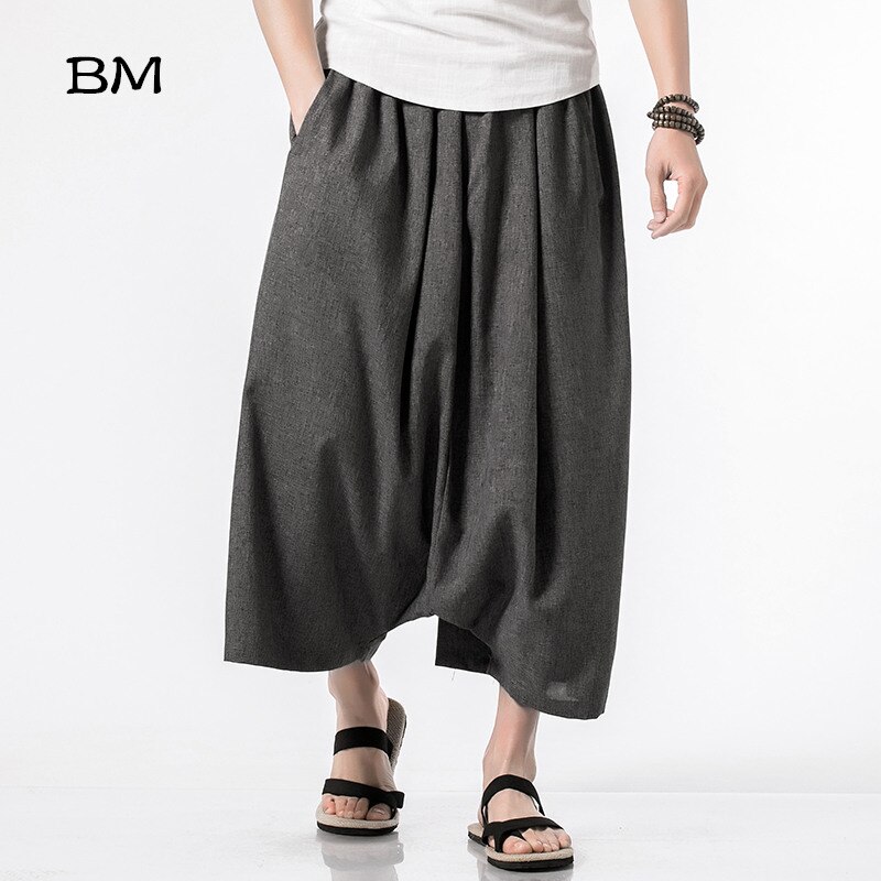 Mannen Laag Kruis Wijde Pijpen Cross Broek Plus Size M-5XL Elastische Taille Effen Kleur Casual Broek Mannelijke Mode Toevallige harem Broek
