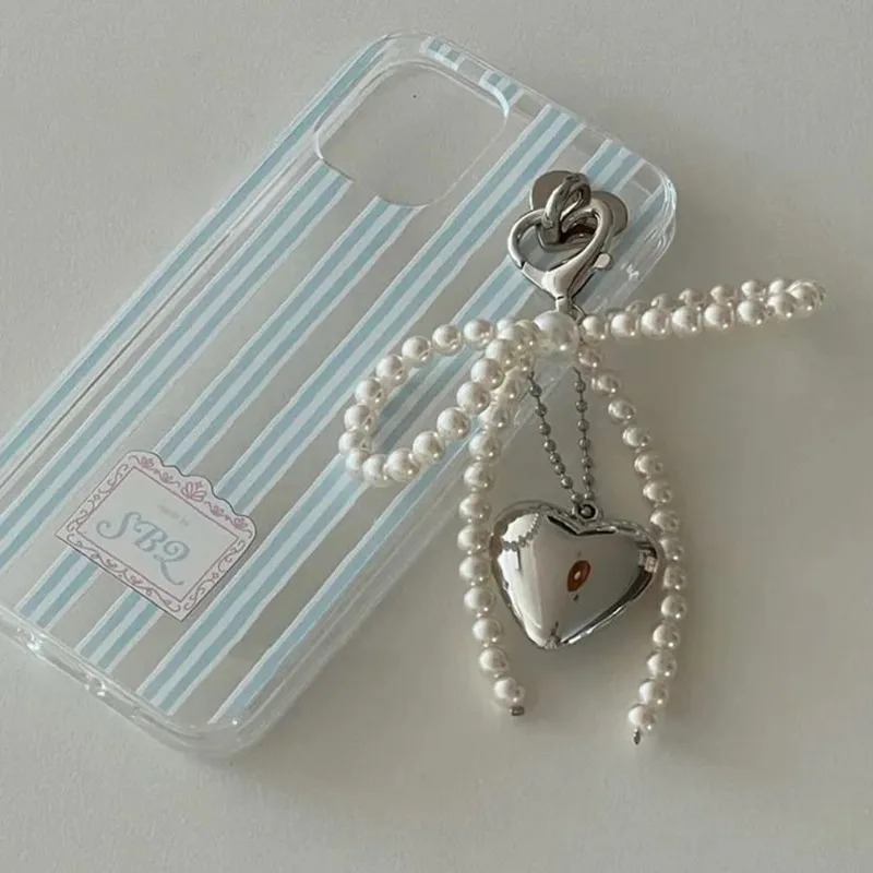 LLavero con forma de corazón y lazo de perlas, mochilas, llavero con forma de corazón con lazo, accesorios colgantes DIY para bolso, teléfonos móviles universales