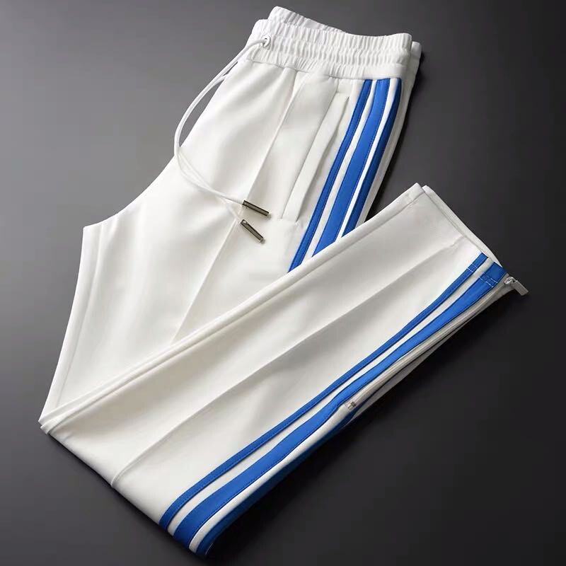 European and American stripes hit color casual sports pants spring elastic waist drawstring air layer pants: XL / White