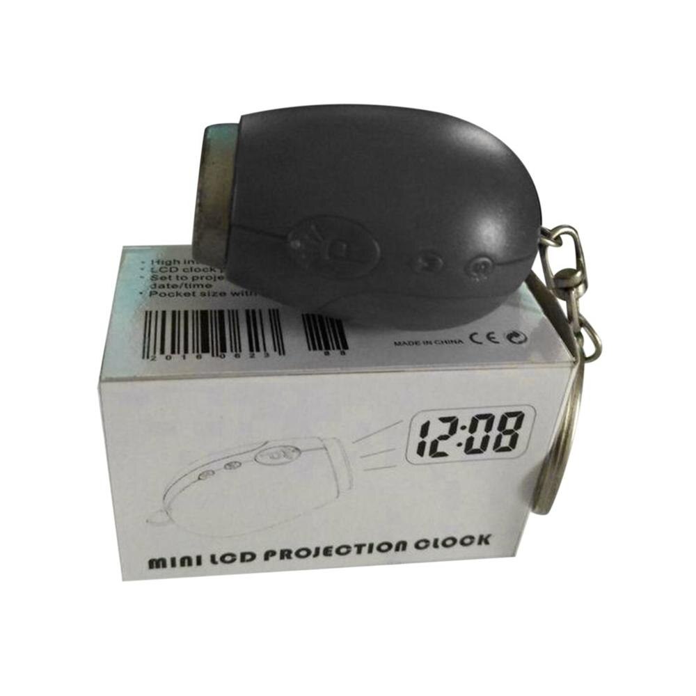 Moderne mini digitale projectieklok zaklamp draagbare led klok muur plafond tijd projectie horloge magische elektronische klok: Zwart
