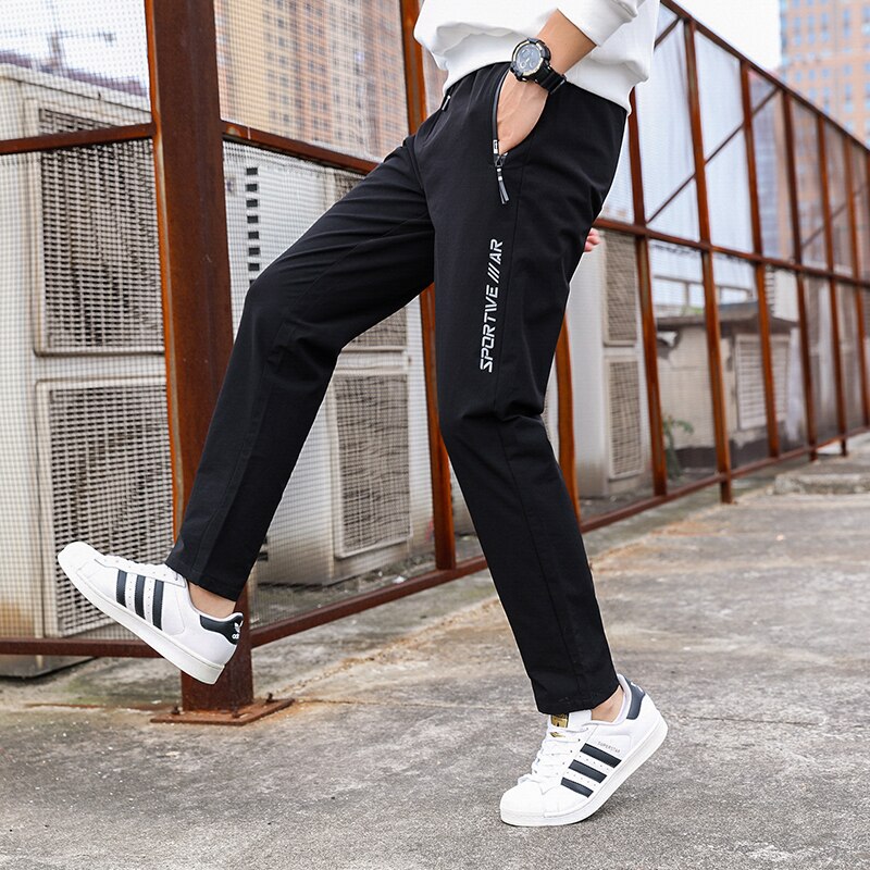 Generisch Sportbroek voor heren, lang, effen, elastische taille met zakken, zijden broek, dunne casual broek, ademende riem, los, hoge sneldrogende airconditioning, donkergrijs, L