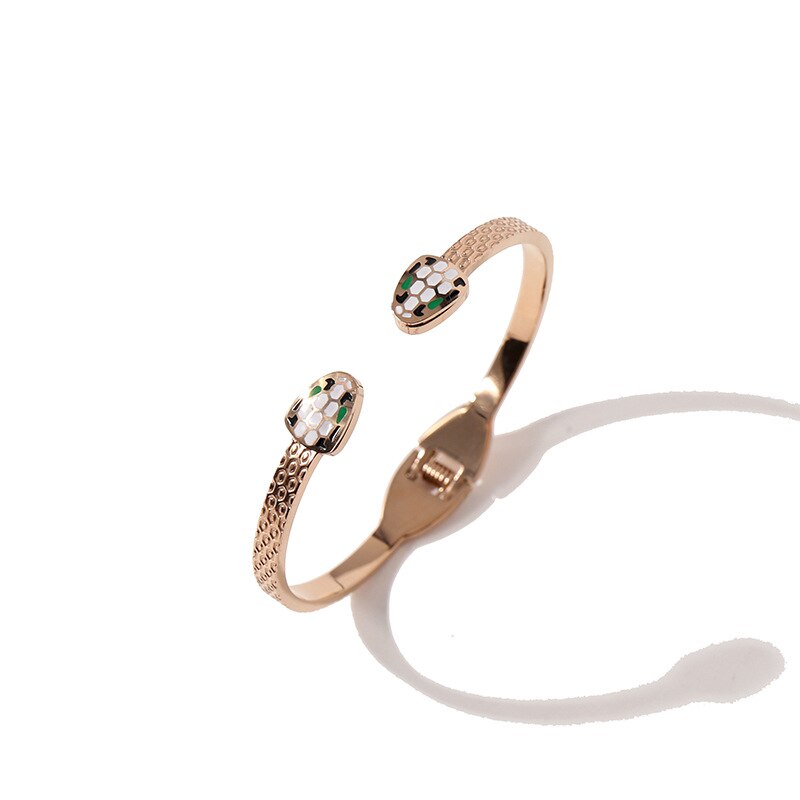 Marca europeu e americano quente-venda jóias moda pulseiras requintado brilhante cabeça de cobra forma presentes para os amantes: rose gold