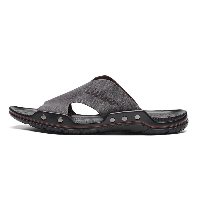 Pantoufles d'été Hommes Évider Respirant Plage Sandales Chaussures Hommes Décontracté Chaussures Plates Claquettes En Cuir Pantoufles Zapatos