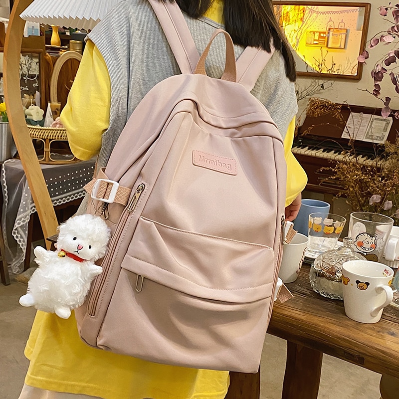 Wasserdichter nylon-rucksack für damen mit mehreren fächern, ideal als schülerrucksack, reisetasche, büchertasche oder schulrucksack für teenager, mädchen und jungen.