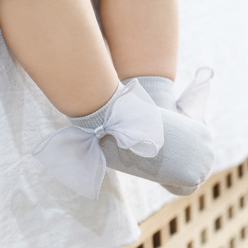 Antislip sokken voor baby's met strik, voor peuters, pasgeborenen, antislip sokken voor meisjes en jongens, effen kleur
