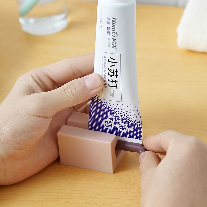 Tandpasta dispenser doven spin klemme tandpasta klip manuel klemme sæde badeværelse vask forsyninger