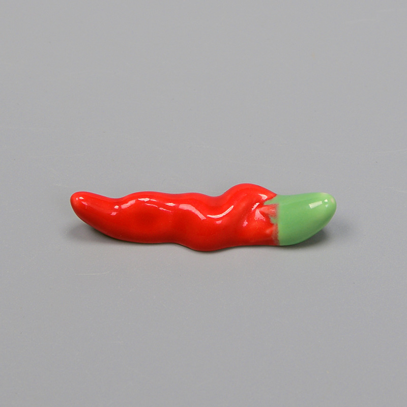 Handgjorda keramiska chili ätpinnar i japansk stil söta grönsaks ätpinnar som stödjer hantverk hemma matbord