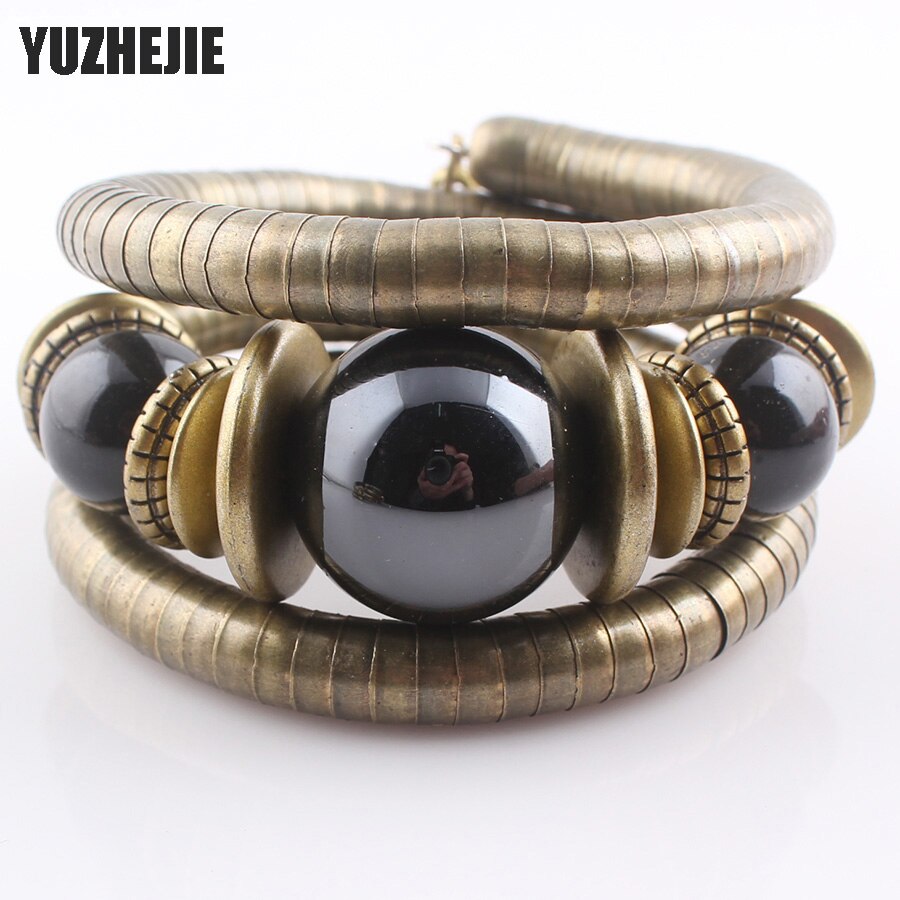 YUZHEJIE Jewelry Tibetan Antique Bronze Snake Bracelet Resin Inlay Roundness Bead Flexible Bracelet Bangles for women