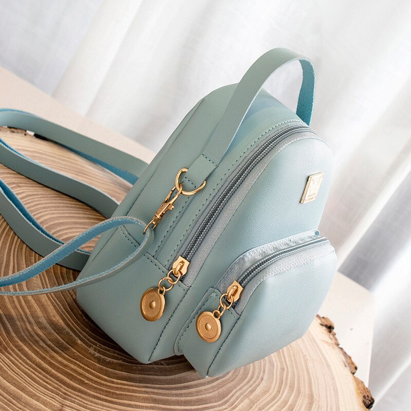 NIGEDU mini sac à bandoulière pour femmes dames sacs à main cuir PU bonbons couleurs forme populaire filles sac à bandoulière sac à dos noir