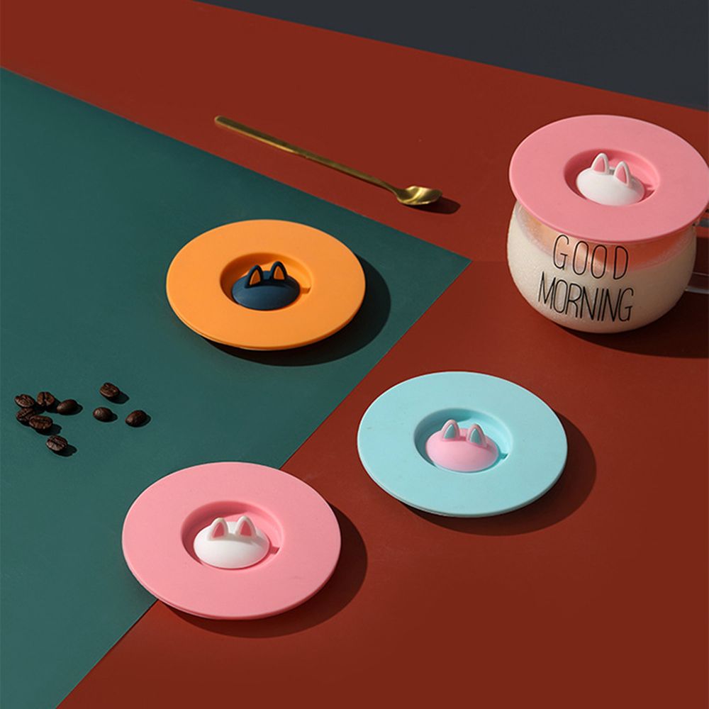 Durable, non-toxic, reusable coffee mug with sealed cover and anti-scalding suction cup lid.