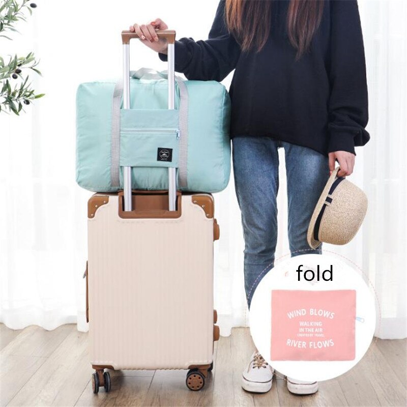 Borsa da viaggio pieghevole in Nylon Unisex borsa impermeabile di grande capacità per bagagli da donna borse da viaggio pieghevoli Organizer cubi da imballaggio