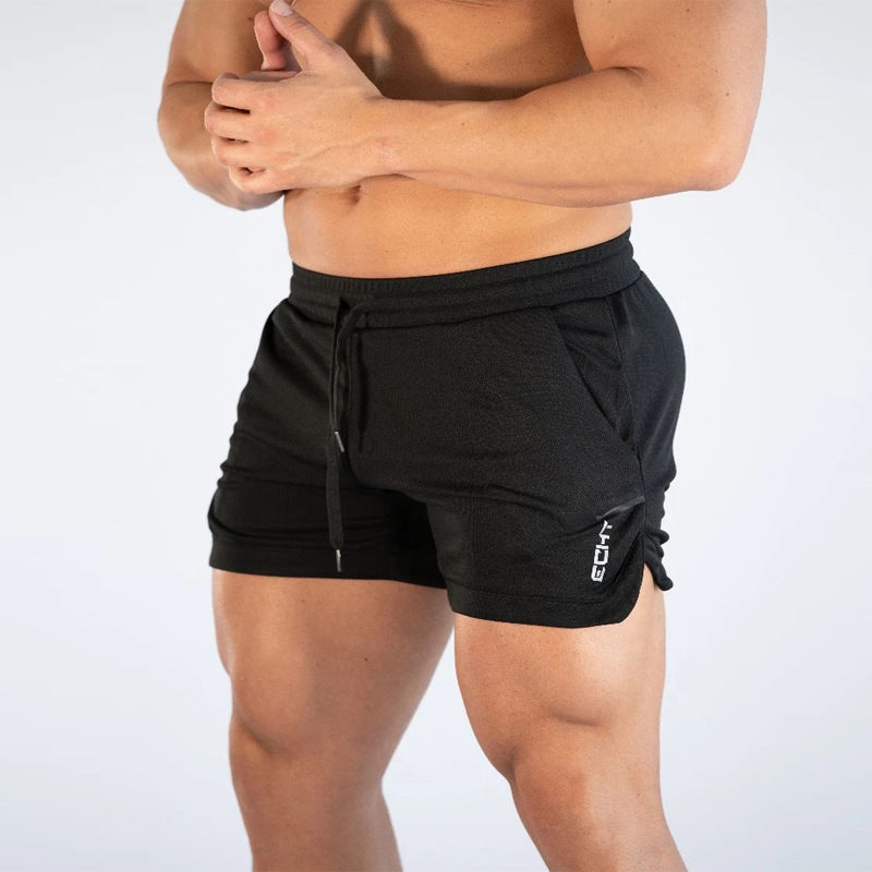 muscle fitness fitness sports casual men's shorts European and American trend running training breathable fitness pants: XXL / Black