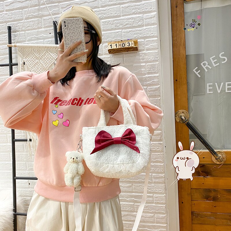 Design original 2021 marca design original macio meninas queda/inverno de pelúcia saco borboleta menina sistema loli artesanal saco ombro: White