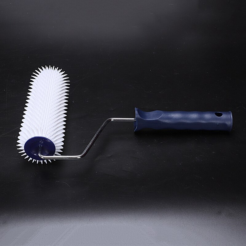 7" plastic handle Spiked Roller