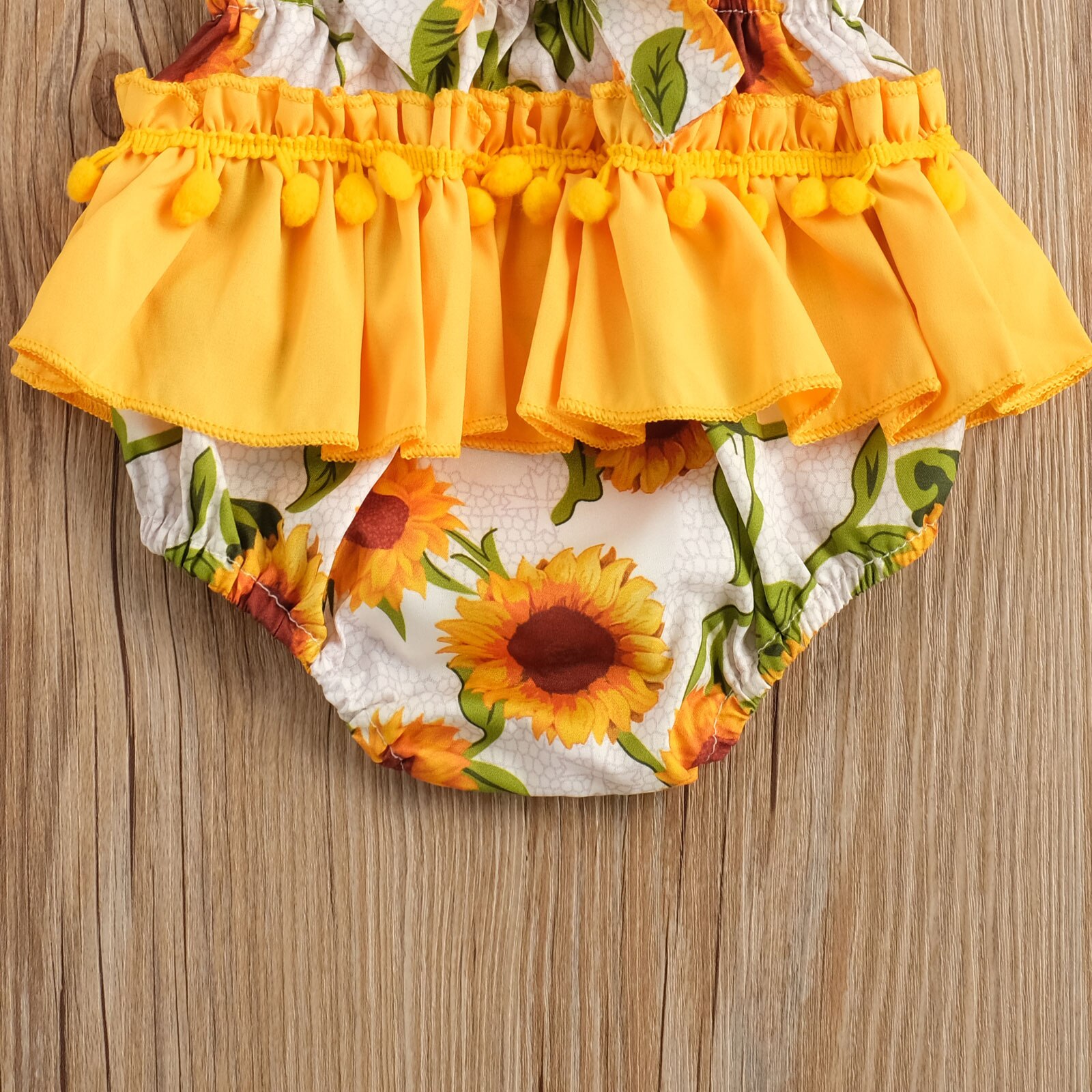 Pelele de girasol para bebé niña, Linda manga de volantes tira de pompones Trim body ropa de verano