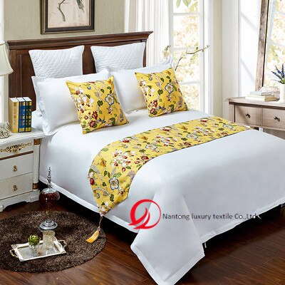 Golden decorative bed runner