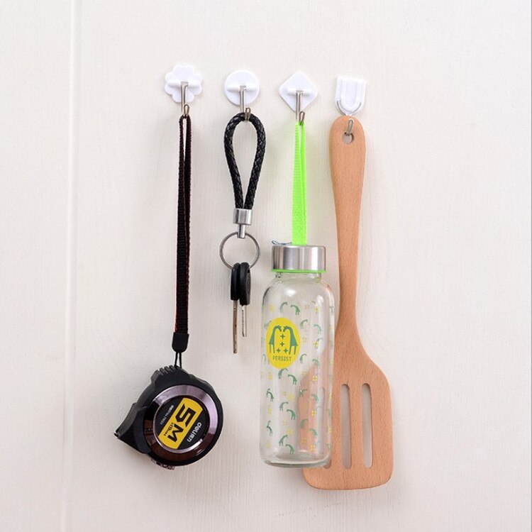 Gancho pequeño de trompeta de plástico blanco de dibujos animados, fuerte adhesivo para cocina, accesorios de baño, toalla, bolso de mano, colgador de pared, 1 ud.