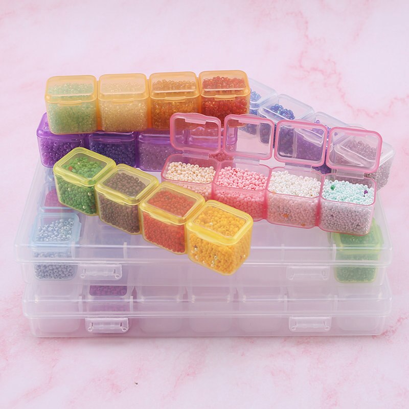 Caja de almacenamiento de plástico para joyería, contenedor rectangular de 28 ranuras, 17,5x10,7x2,7 CM, cuentas de diamantes de imitación, píldoras, pendientes