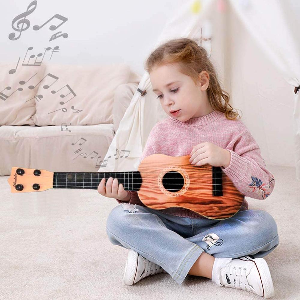 Mini ukulele leksaksgitarr för småbarn, musikaliska ukuleler med plockningar och noter för barn, nybörjare musikinstrument för barn