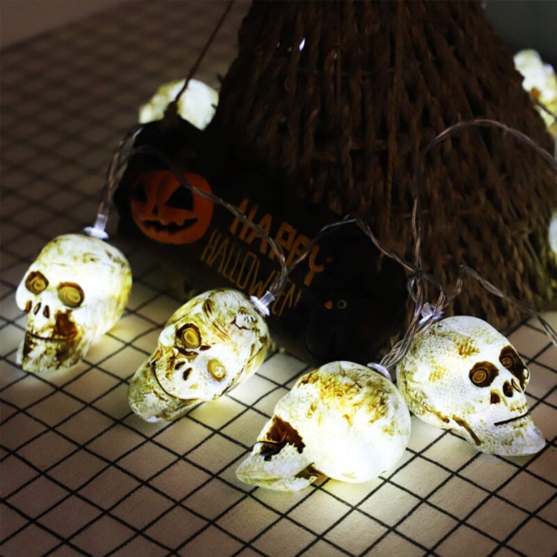 Halloween lichtsnoer met 10/20 led-lampjes, een lichtsnoer met led-lampjes, een pompoen, een skelet, een bot, een spook, een vleermuis en een spin.: Schedel 1 / 1.5m 10 geleid