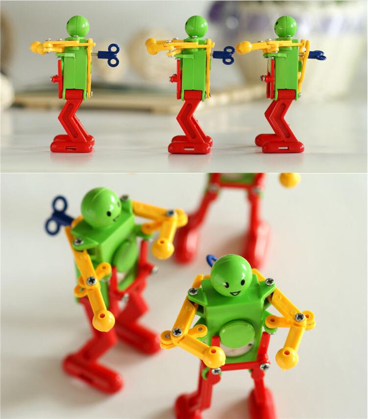 Så samle 1 stk urværk spring wind up dansende robot legetøj børn børn