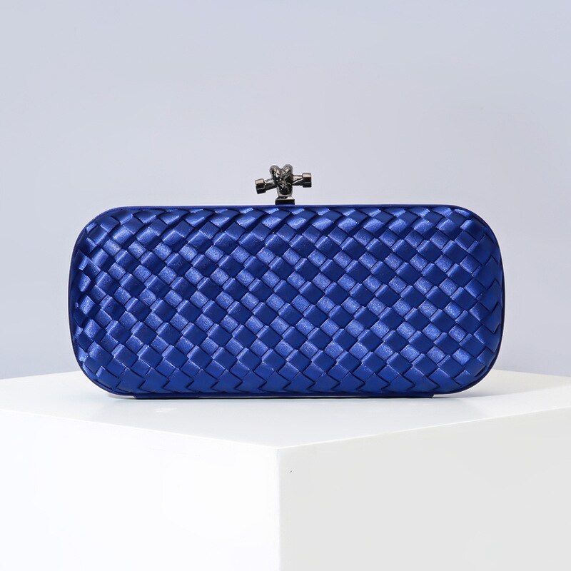 Bolsa de maquillaje de seda europea y americana tejida a mano para mujer, bolsa de maquillaje de mano para mujer, a través de la sencilla bolsa de maquillaje para Cena