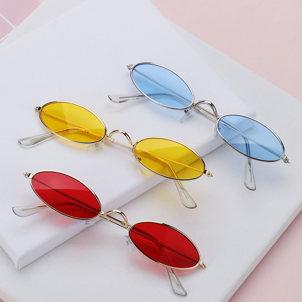 Gafas de sol ovaladas con montura pequeña para hombre y mujer, lentes clásicas de estilo Retro, de Color metálico, a la
