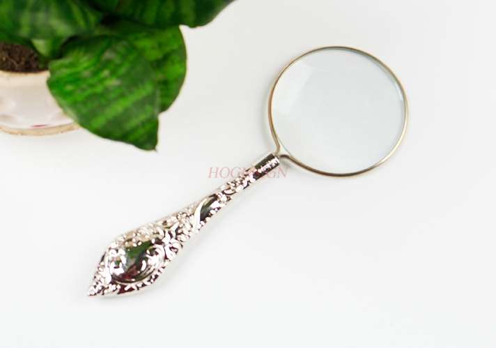 magnifying equipment Magnifying glass portable handheld optical glass old man looking at mobile phone magnifying