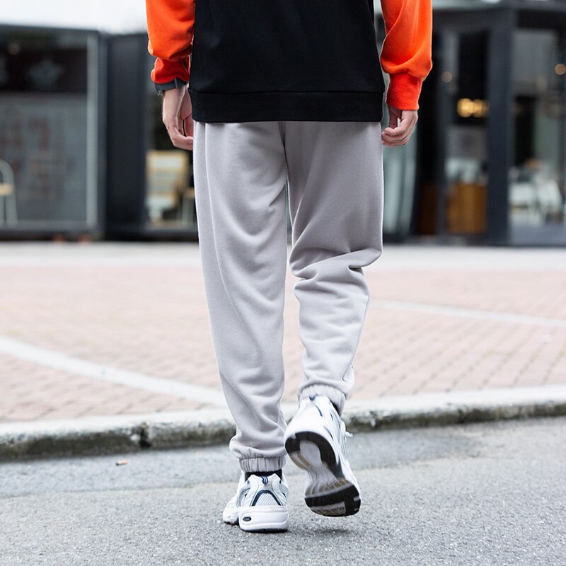 Streetwear løse mænd bukser udendørs sportsbukser ankel bundet mellem talje elastik mandlig hip-hop bogstav efterår lange bukser