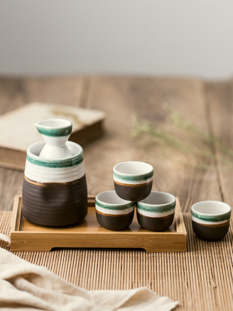 Keramische sake wijn set warm wijn pot thuis geel wijnfles wit glas wijn separator