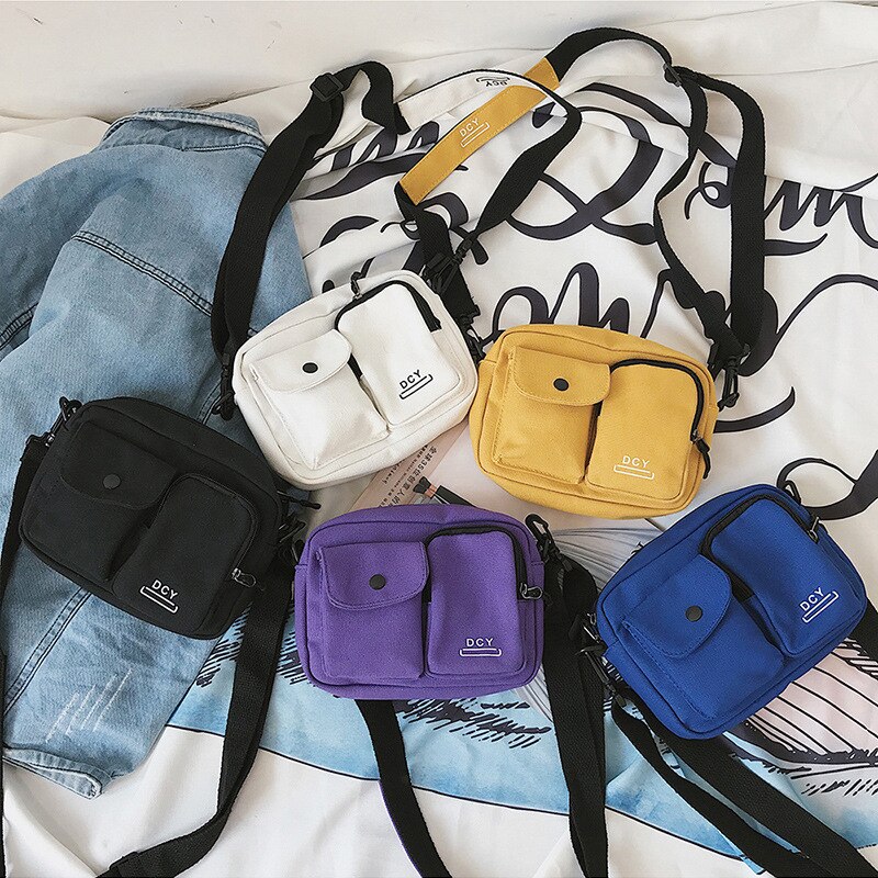 Simple classique toile sacs pour femmes nouveauté femmes moraillon couleur unie de base femme lettres sacoche à fermeture éclair