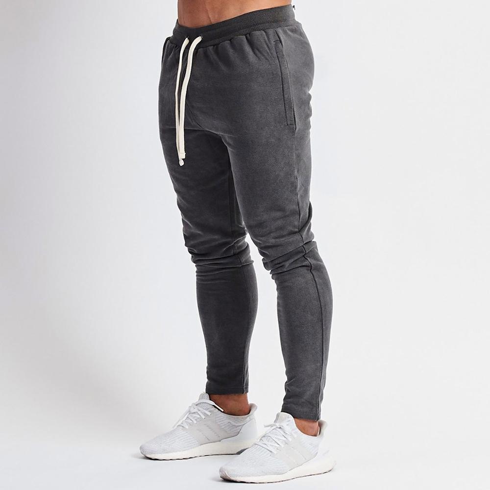 Sportbroek heren joggingbroeken joggingbroeken gele zomer effen broek zwarte joggingbroek fitness heren sportkleding broeken sport