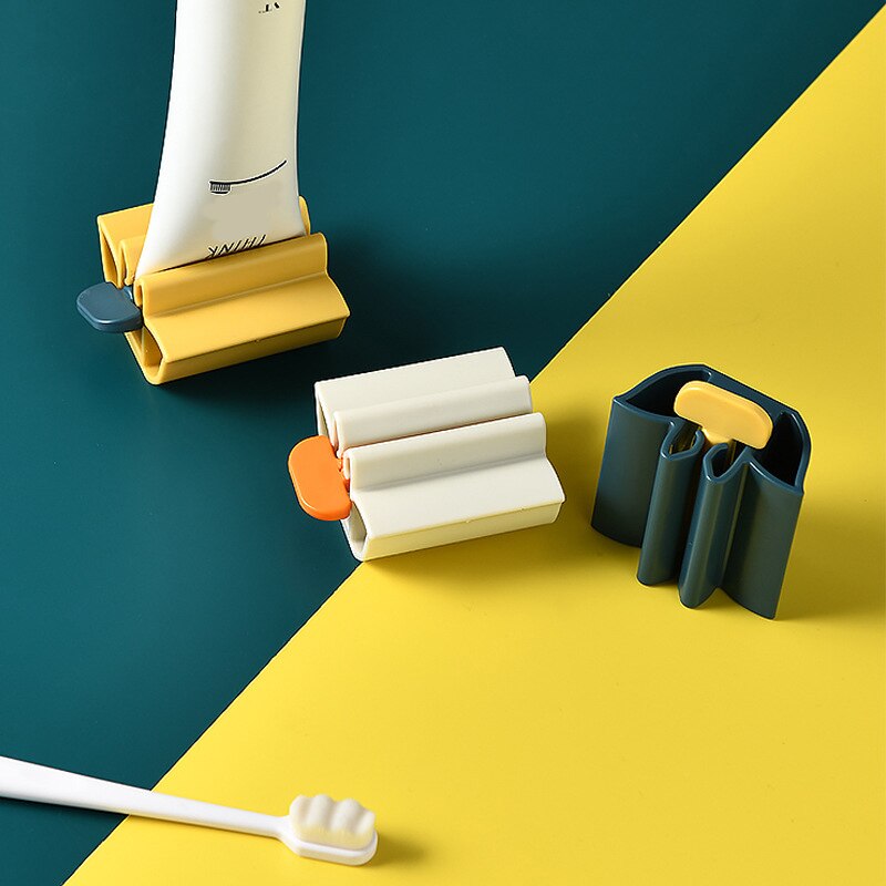 1pc multifunctionele tandpasta dispensers, gezichtsreiniger knijpers, rollende tandpasta knijpertubes, badkameraccessoires