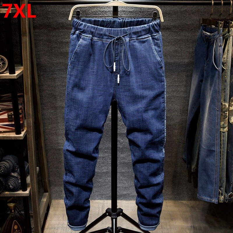 Large size jeans black men&#39;s man plus size harem pants autumn elastic stretch Slim feet trousers 7XL 6XL 5XL